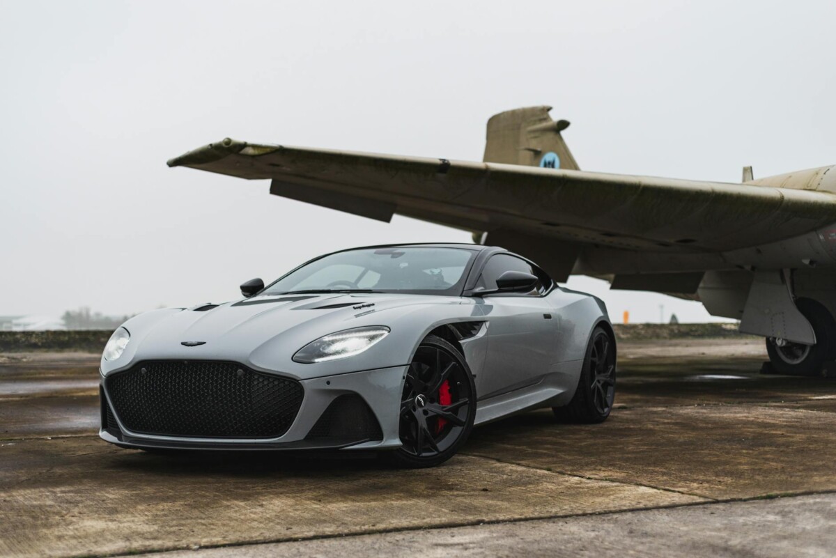 a car parked beside airplane